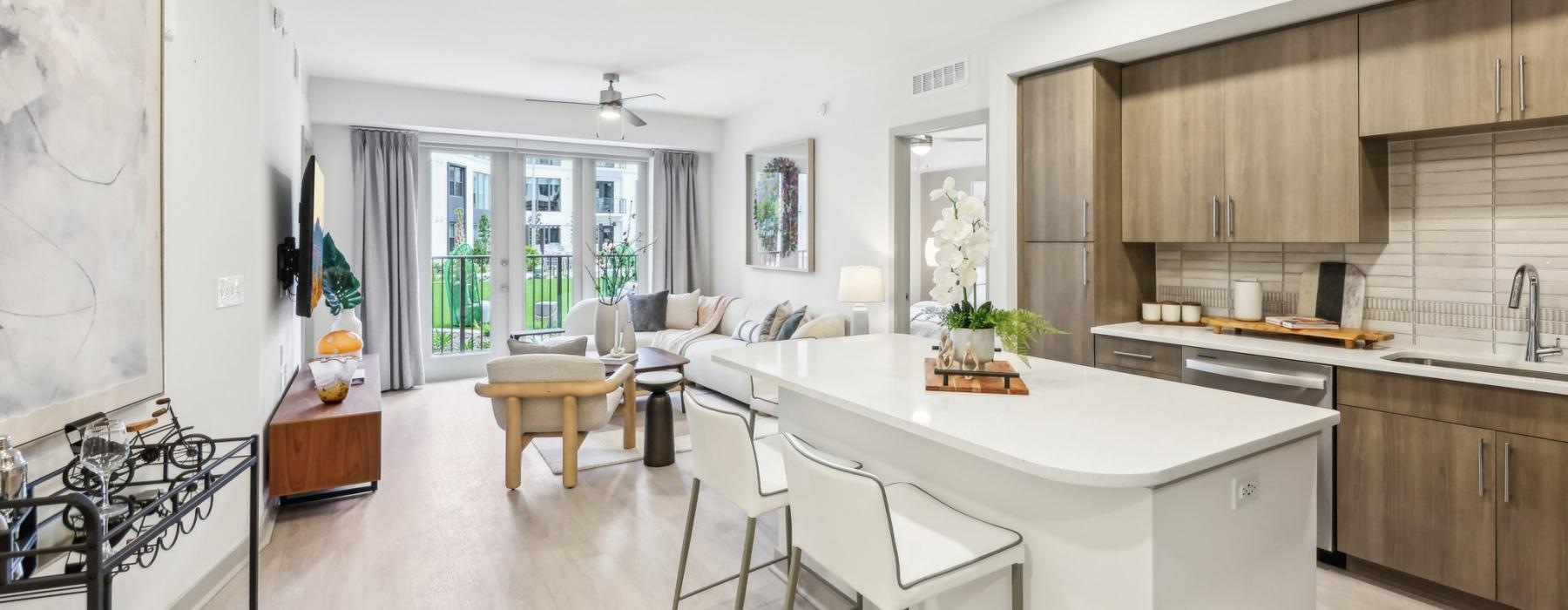a kitchen with a dining table and chairs