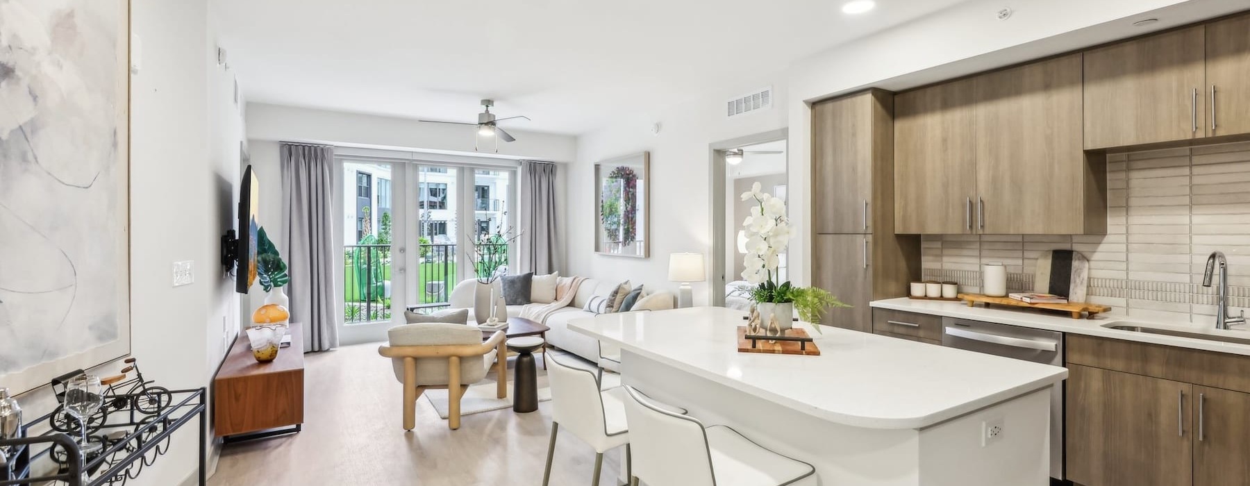 a kitchen with a dining table and chairs