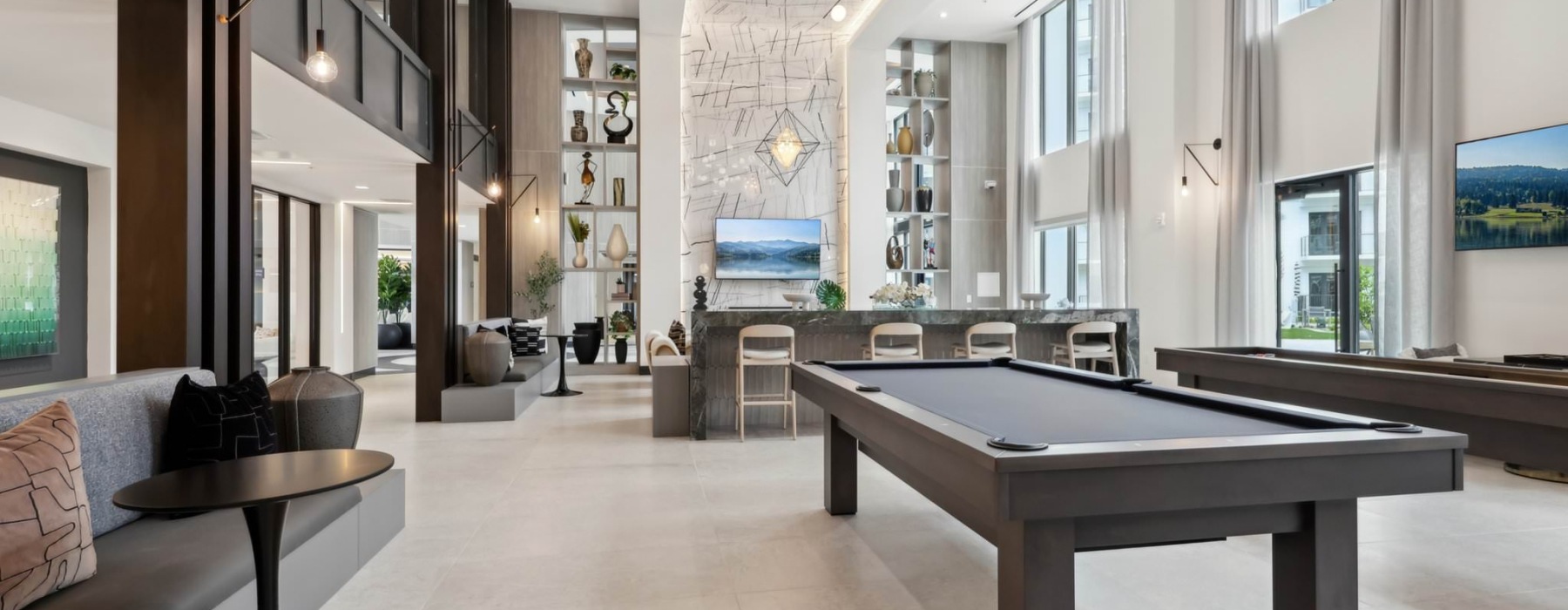 a resident lounge with a pool table