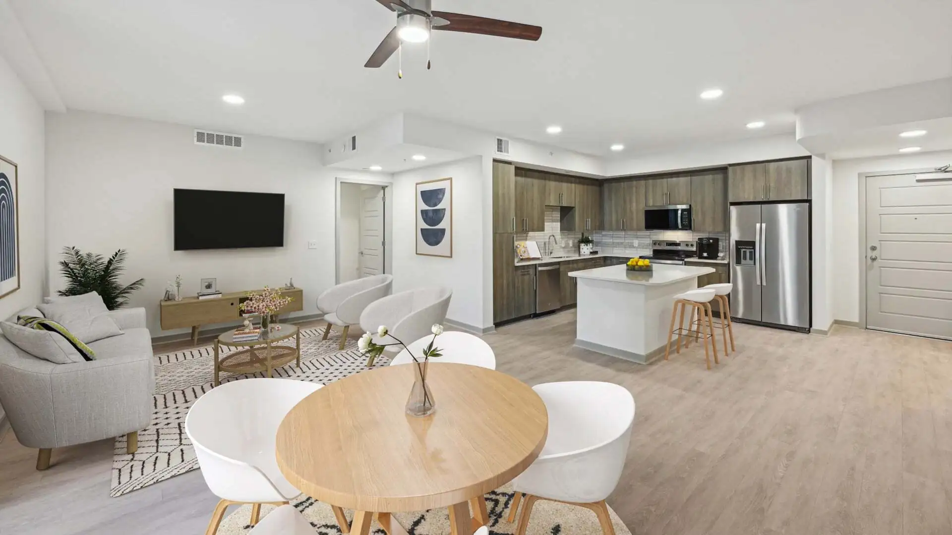 kitchen and living room view within a residence at The CenterPointe Apartments in Altamonte Springs near Orlando